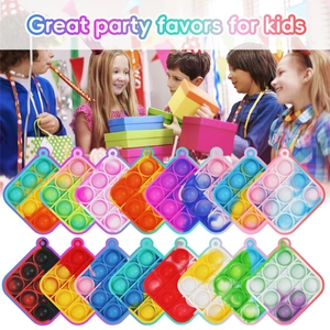 Rainbow mini pop it fidget toys for kids party favors with keychains in various colors