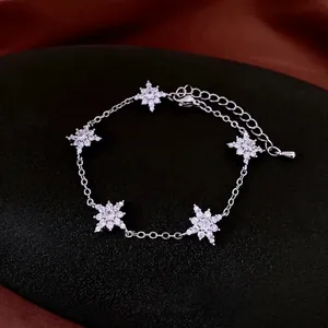 Elegant silver snowflake bracelet with sparkling zircons and adjustable lobster clasp closure