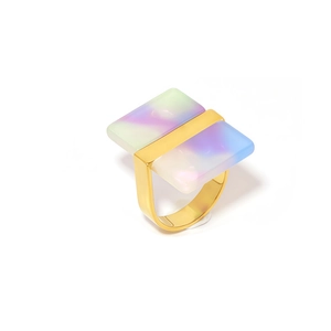 Detail of 18k gold plated U-shaped ring featuring a rectangle rainbow gradient stone