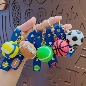 Cartoon sports ball keychains with silicone straps featuring football and basketball
