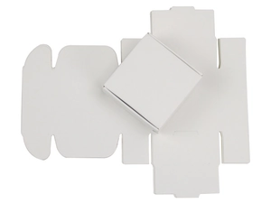 Flat lay of small white kraft paper jewelry box shown assembled and flat for shipping