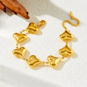 Minimalist gold heart link bracelet in stainless steel with adjustable lobster clasp closure