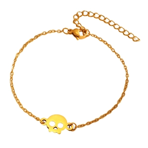 Gold hollow skull pendant bracelet with adjustable link chain and lobster clasp on white background
