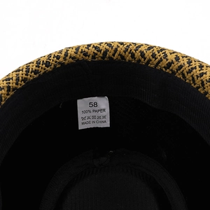 Mens woven paper straw fedora hat with size 58 label and internal sweatband detail