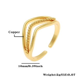 Macro detail of multi-layer copper open ring showing dimensions and material texture