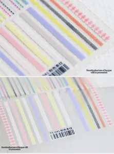Macro shot of ultra-thin pink stripes and colorful lines on TS-041 nail art stickers