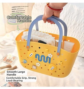 Portable bright yellow hollow bath basket with blue handle and cute decorative charms