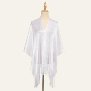 Silver metallic knit shawl with fringe trim displayed on a mannequin for elegant styling