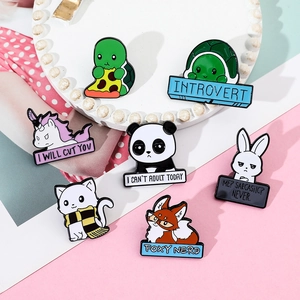 Detailed view of 7 cute animal enamel pins on a decorative plate with sarcastic slogans