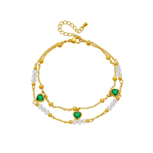Double-layered gold anklet with green heart pendants and clear faceted beads