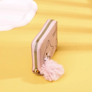 Pink zippered wallet with cute shiba inu dog print and a soft fuzzy pompom keychain