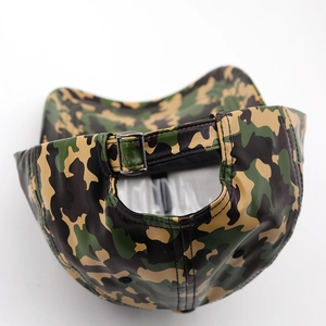 Detail of adjustable metal buckle on green camouflage PU leather baseball hat back