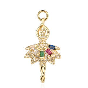 Golden ballerina pendant with colorful zircon stones and tiny diamonds on white background