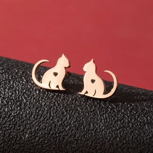 Elegant rose gold cat stud earrings with heart cutout design for women on leather