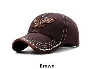 Detail of brown cotton baseball cap showing intricate eagle and star embroidery work