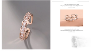 Detail of rose gold twist band ring with micro-pave white cubic zirconia stones