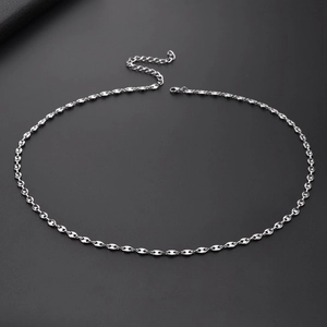 Detailed macro view of silver coffee bean link necklace with lobster clasp and chain