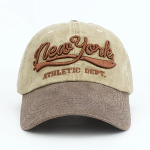 Close-up of 3D New York embroidery on two-tone vintage washed cotton baseball cap