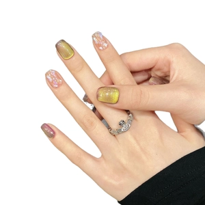 Short square purple cat eye press-on nails with chameleon glass bead aurora design