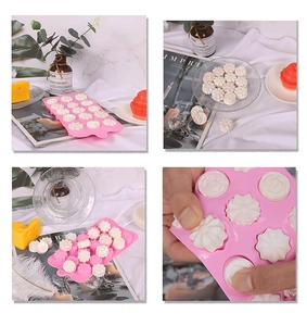 Detailed view of pink silicone flower mold for chocolate and soap with demolding demonstration