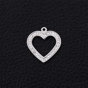 Hollow heart pendant in silver stainless steel with sparkling rhinestones on leather