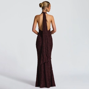 Detail of dark brown lace maxi dress with deep V back design and long neck ties