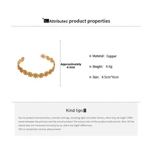 Detail view of hollow flower copper bangle with 4.5cm opening and 6.6g weight