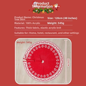 Detail of red 120cm knitted Christmas tree skirt with white reindeer and snowflake motifs