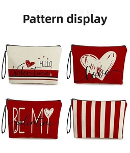 Detail of four Valentine's themed heart patterns on canvas makeup bags with zippers