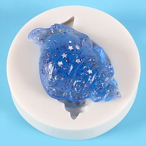 Blue seashell silicone mold with sparkling resin crafts for DIY cake decorating