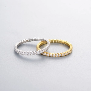 Eternity rings in gold and silver finish with micro-paved cubic zirconia accents