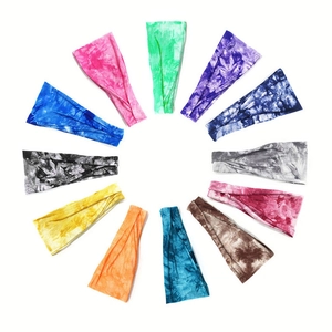 Set of 12 colorful tie-dye elastic sports headbands for yoga and fitness training
