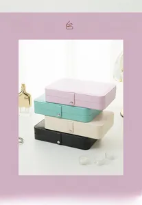 Rectangle jewelry boxes with metal clasp closure in four pastel colors for rings and earrings