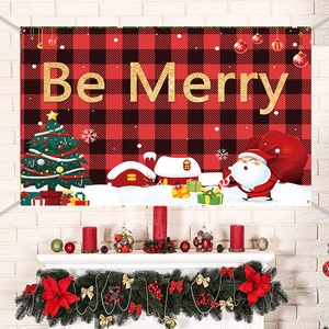 Red and black plaid Christmas banner with Be Merry text displayed over a fireplace mantel