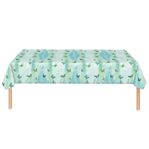 Detail of waterproof spring butterfly pattern tablecloth with fresh green floral edge
