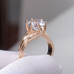 Macro shot of rose gold six-prong engagement ring featuring high-grade AAA zircon stone