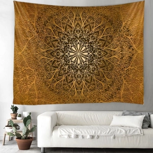 Mandala tapestry wall hanging in bronze gold over a modern white sofa for room decor