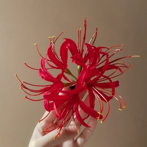 Elegant red lycoris spider lily hair clip with velvety texture and refined floral design