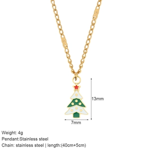Golden stainless steel Christmas tree pendant necklace for women on a clean white background