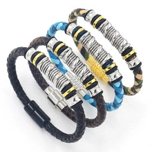 Macro shot of four braided leather bracelets in black, brown, blue, and camo with magnetic clasps