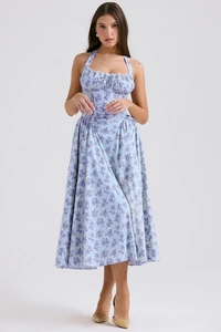 Detailed full view of light blue floral halter dress with slimming waist and A-line hem