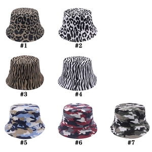 Kids camo and leopard print sun hats in various patterns with a wide brim flat top design