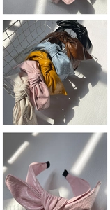 Detail showing various colors of PU leather bow headbands with pleated texture