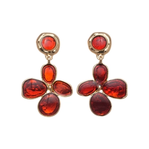 Retro gold flower earrings with translucent red petals in a vintage style