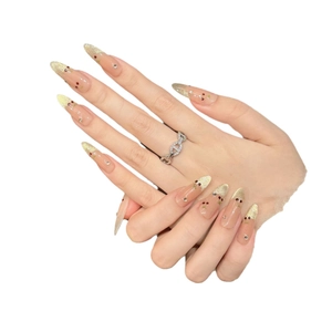 Handmade stiletto press-on nails with gold glitter gradient and red cherry designs