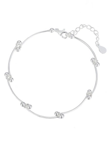 Macro detail of silver minimalist beaded knot bracelet with adjustable lobster clasp