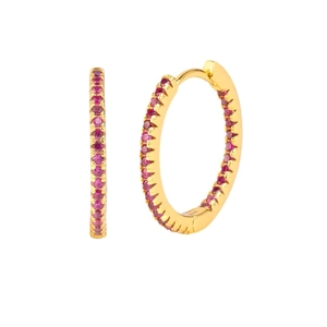 Detailed view of gold plated hoop earrings with micro-paved red zircon stones