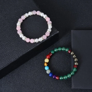Colorful natural stone beaded bracelets set with rose quartz and chakra energy beads