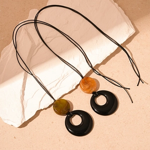 Retro resin round pendant necklace with marble texture beads on a black long cord