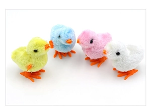 Detail of colorful clockwork plush chicks in yellow, blue, pink, and white colors